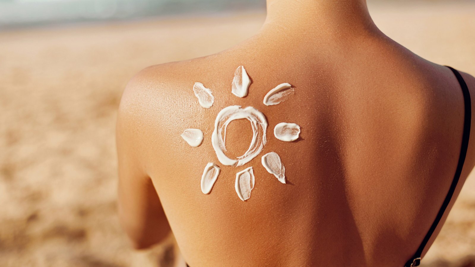 Diagram showing skin tone and UV reflectance differences and how sunscreen films interact with melanin across multiple phototypes